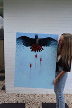 Sarah Slater artist holding painting of Australian bird red tailed black cockatoo